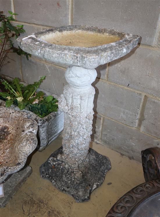 A composition stone bird bath, width 37cm, height 76cm